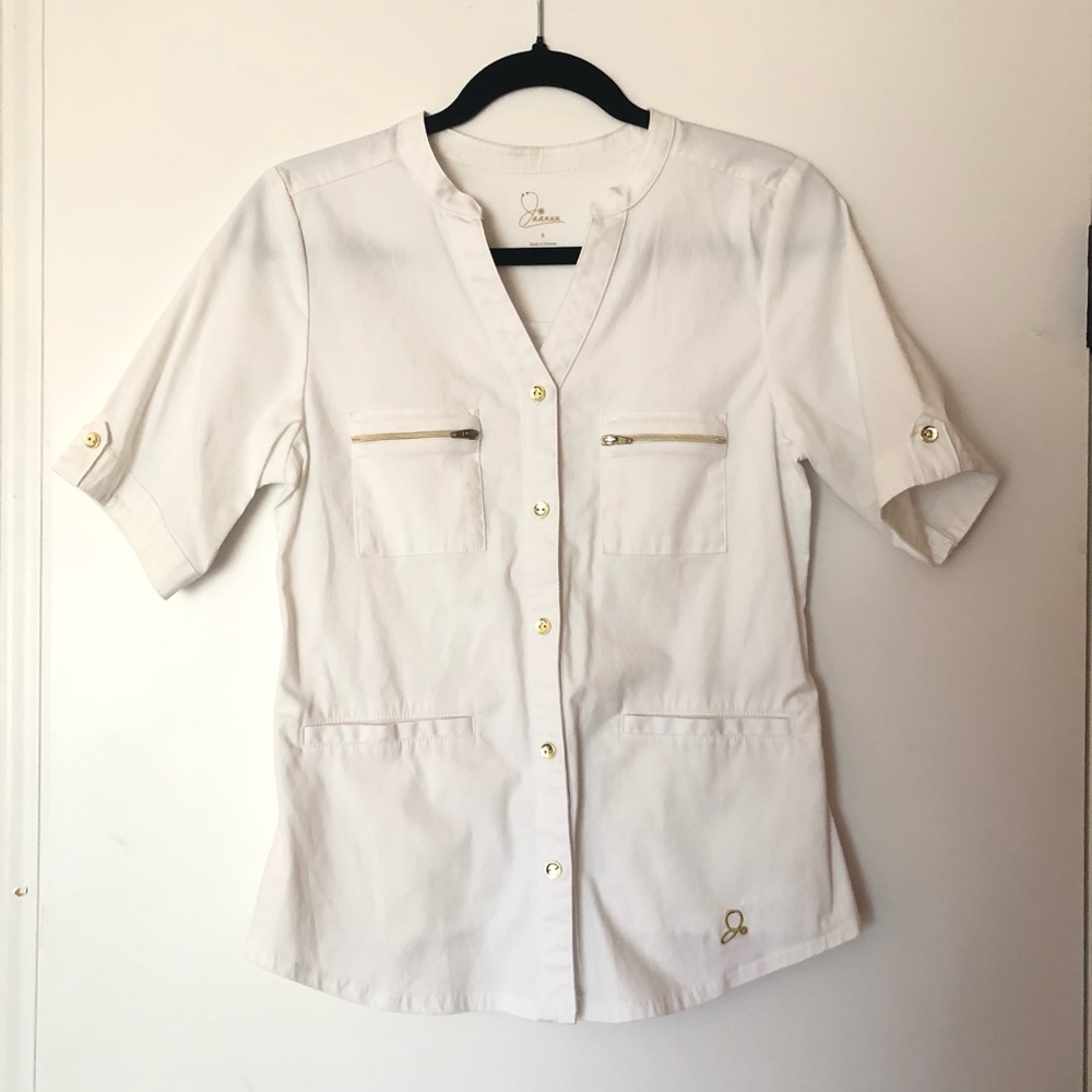 Jaaanuu white with cold accents scrub top